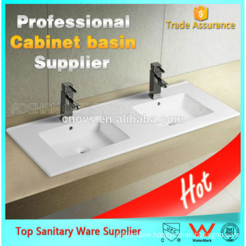 ceramic hot sale bathroom sinks with two faucets